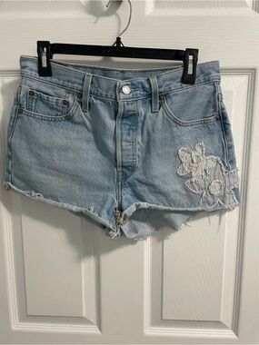 Levi's Light Blue Denim Cutoff Shorts with Floral Appliqué